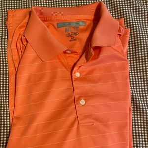 Salmon colored Greg Norman Polo